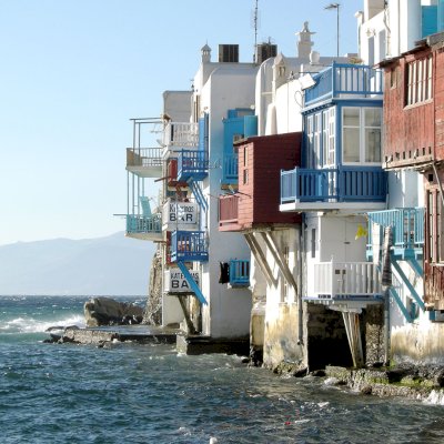 Mykonos white houses next to the sea